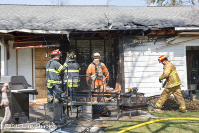 Northfield (IL)  firefighters at the scene of a house fire at 2050 Norfolk Road 3-26-16. Larry Shapiro photo